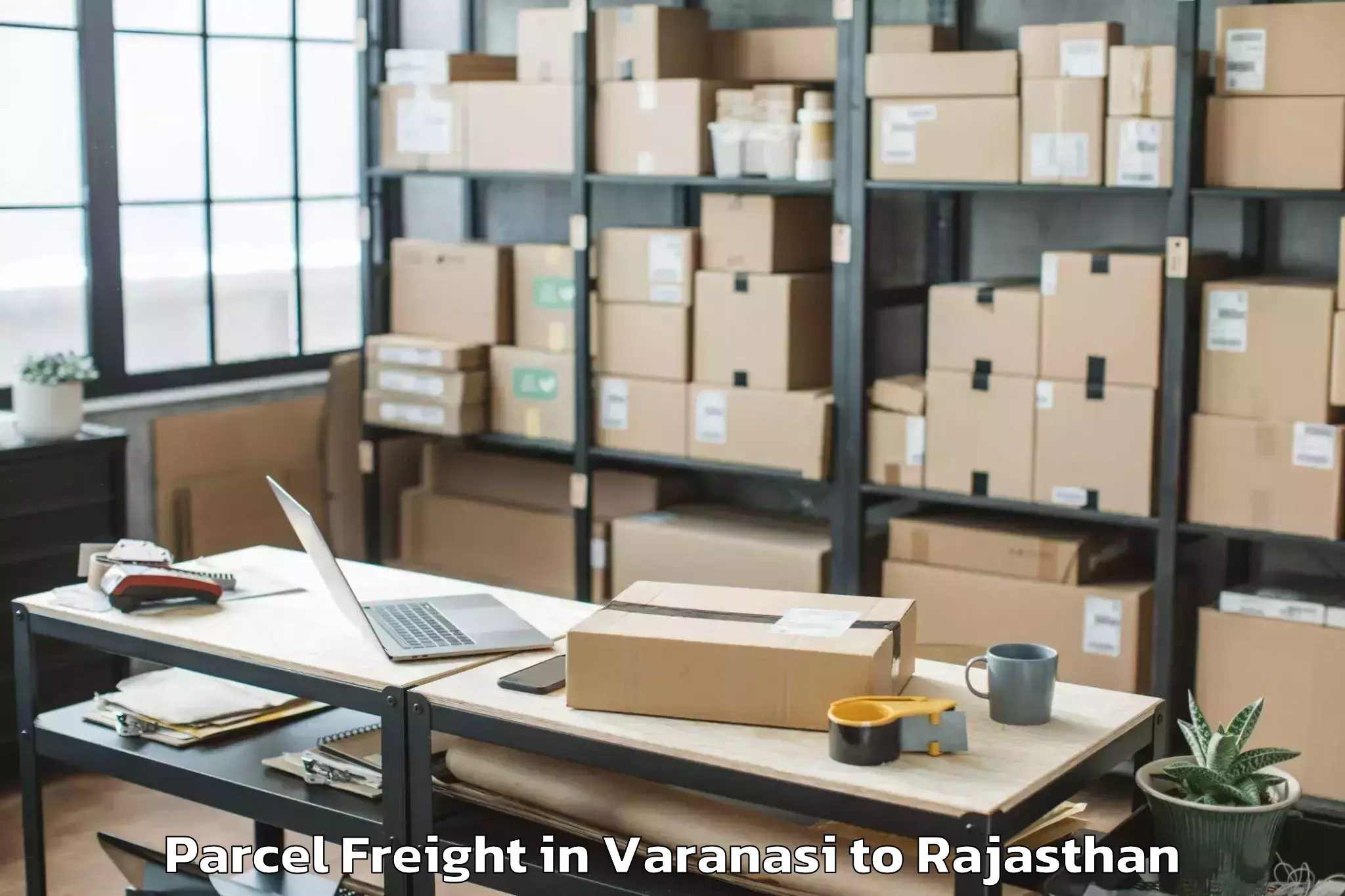 Easy Varanasi to Takhatgarh Parcel Freight Booking